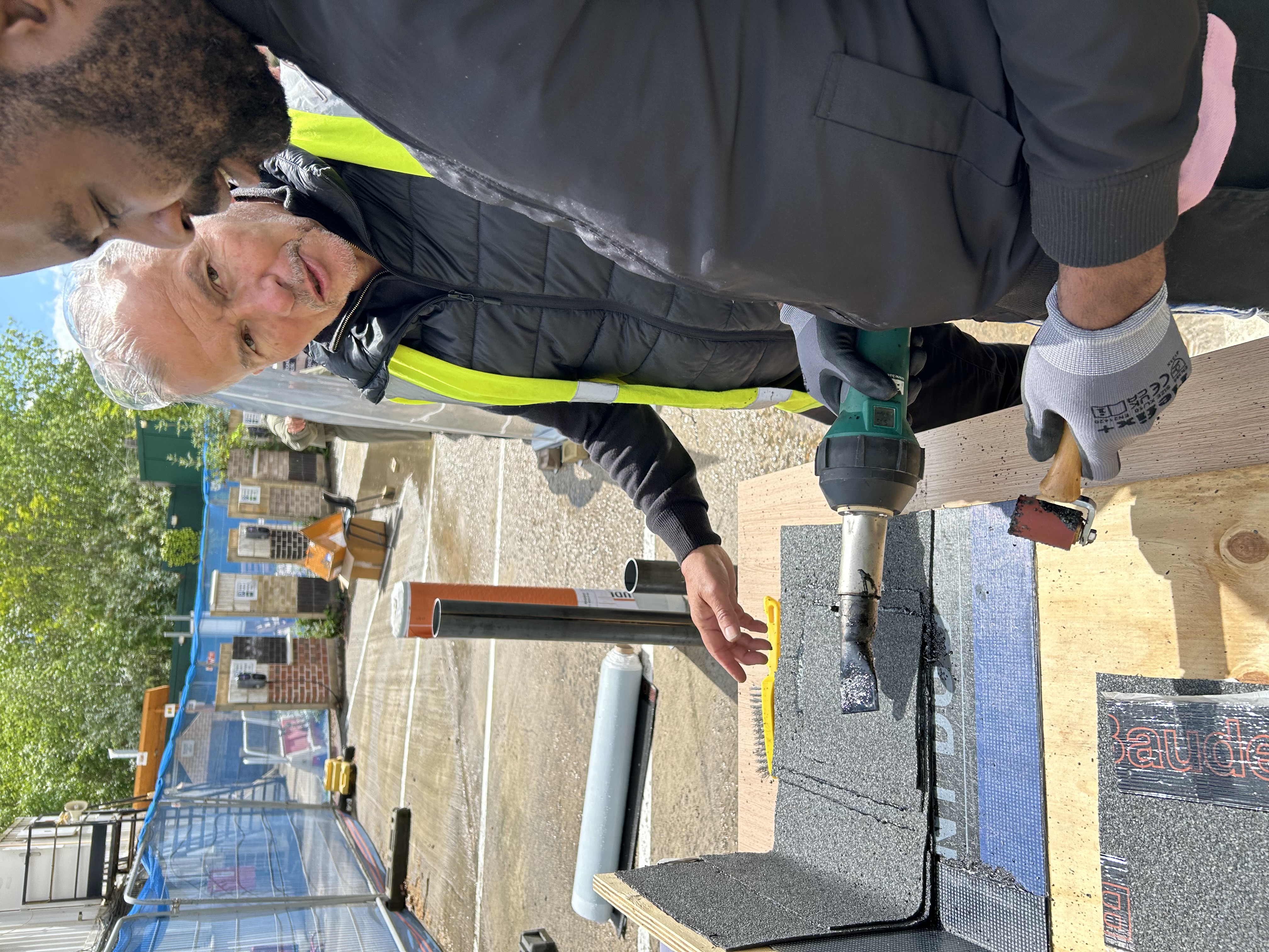 Bauder site technician Ian Richardson demonstrating bitumen membrane application.