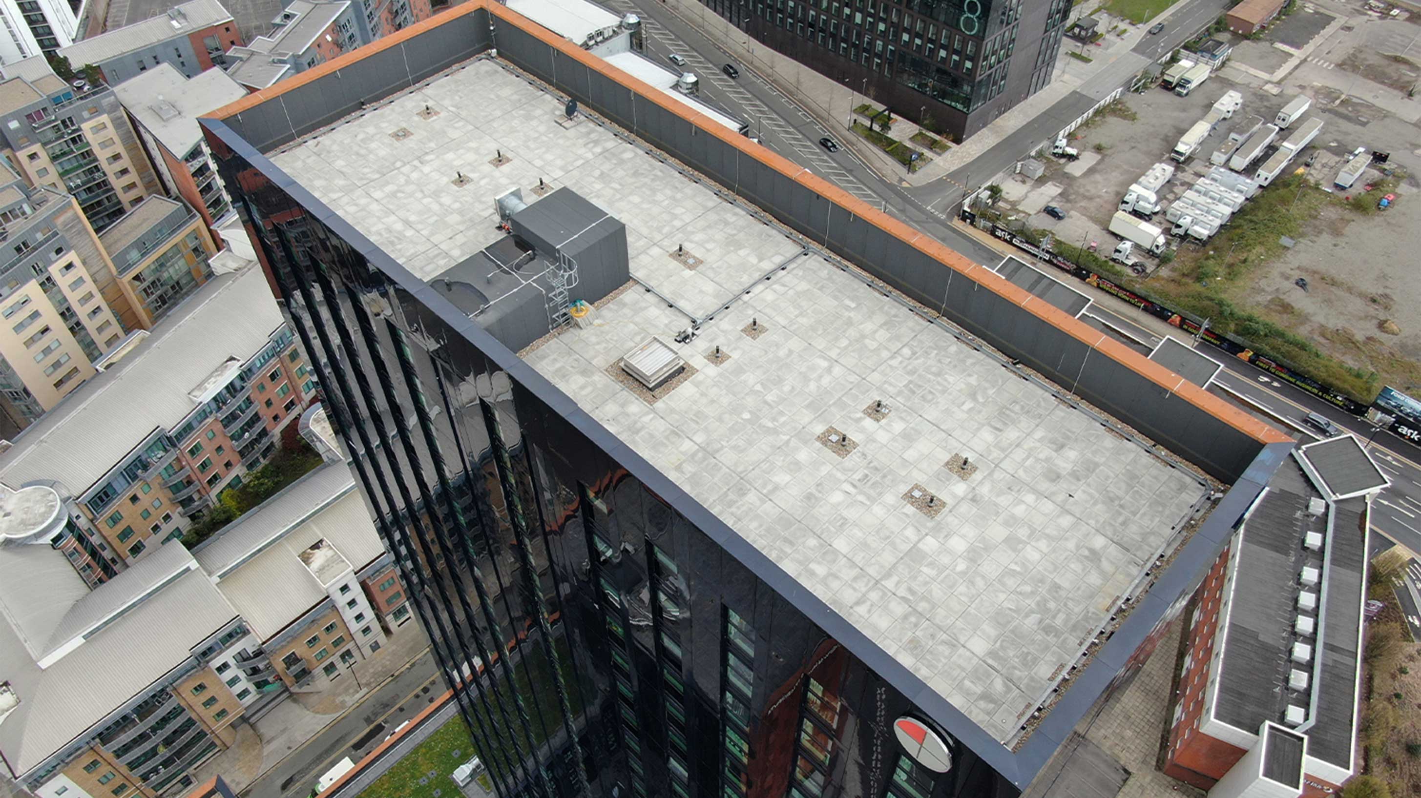 Aerial view of River Street Tower with Bauder Bakor Hot Melt structural waterproofing system with mixed landscaping
