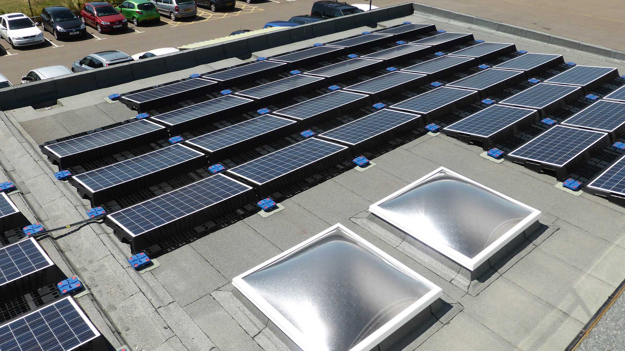 Roundwood Park School roof with Solar Panels and rooflights