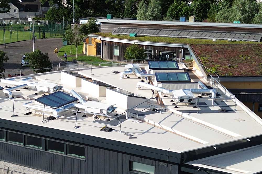 School building with a single ply FPO waterproofing system