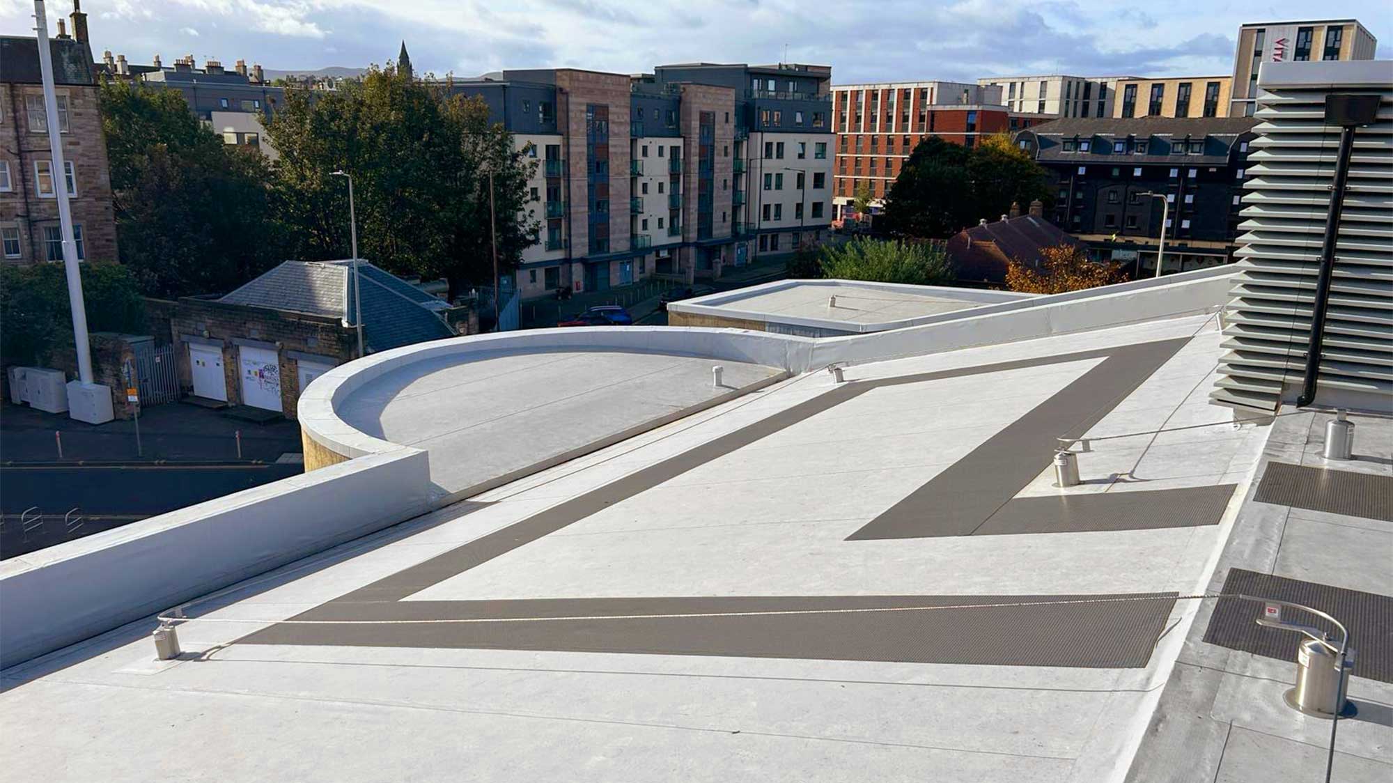 Roof of Tollcross Fire Station with Bauder Thermofol PVC single ply waterproofing with Profiled PIR Infill Overlay System