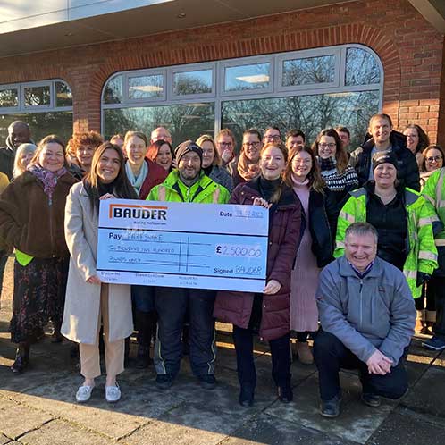 People with a big cheque for Charity fundraising