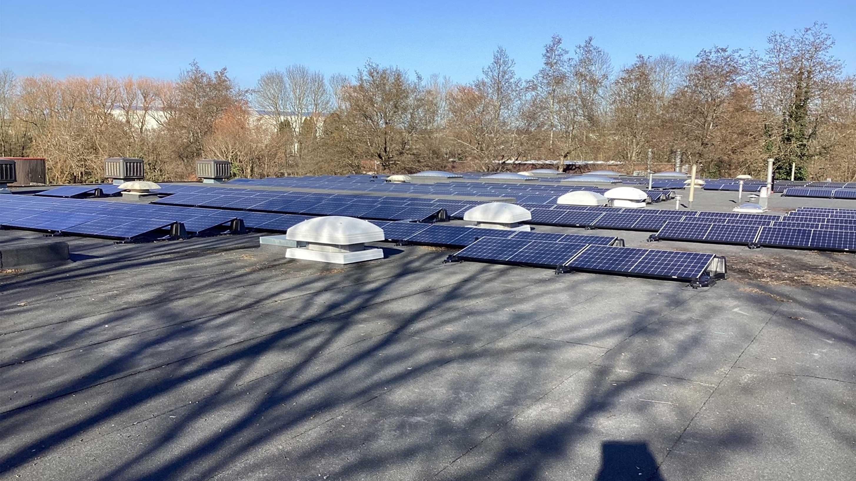 Several solar panels on Red Forge roof