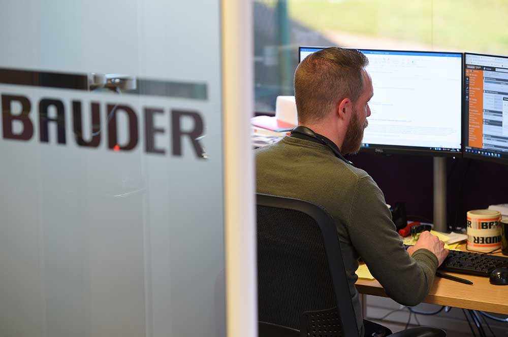 Bauder staff in office