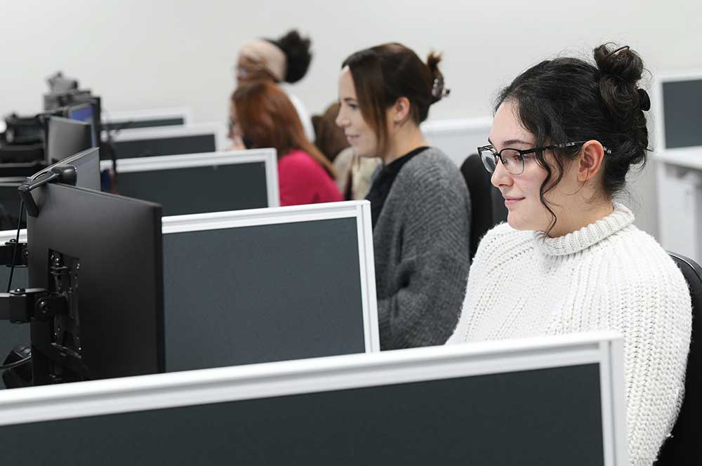 Bauder employees in office