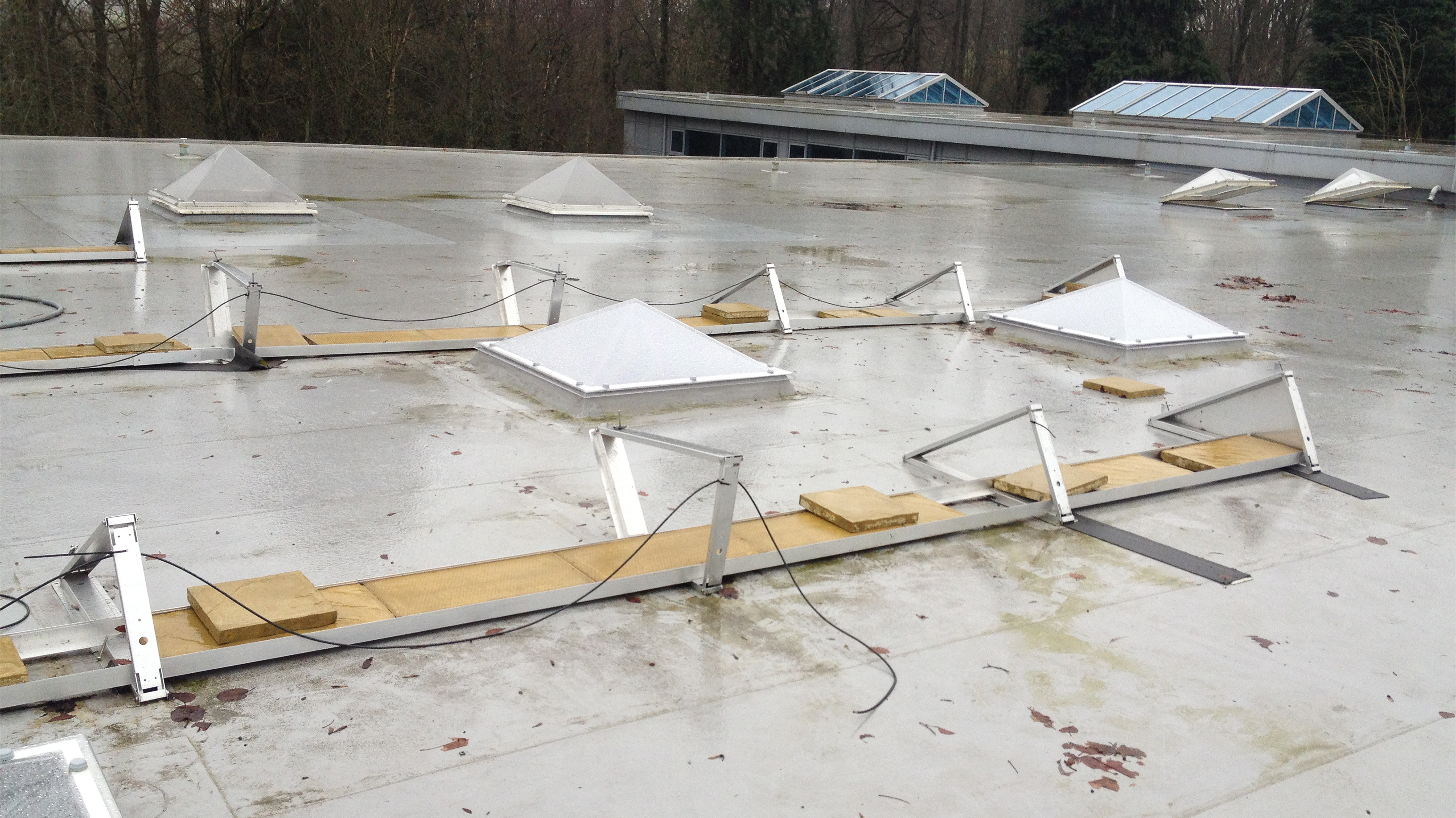 Linn Products Ltd roof undergoing refurbishment with Bauder Thermofol PVC single ply waterproofing system with BauderSOLAR