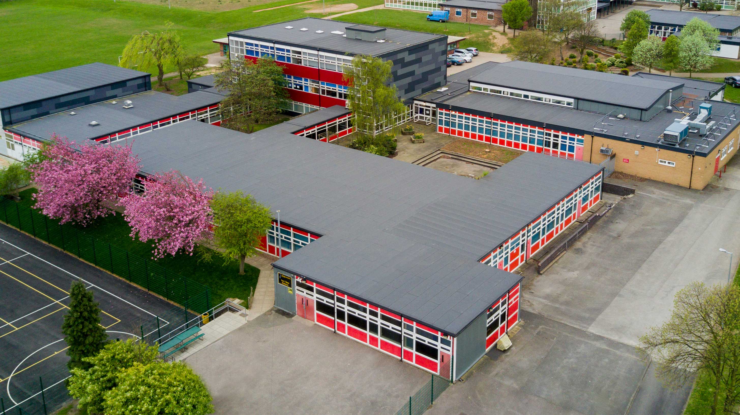 Aerial view of Airedale Academy showing Bauder Total Roof System with rooflights