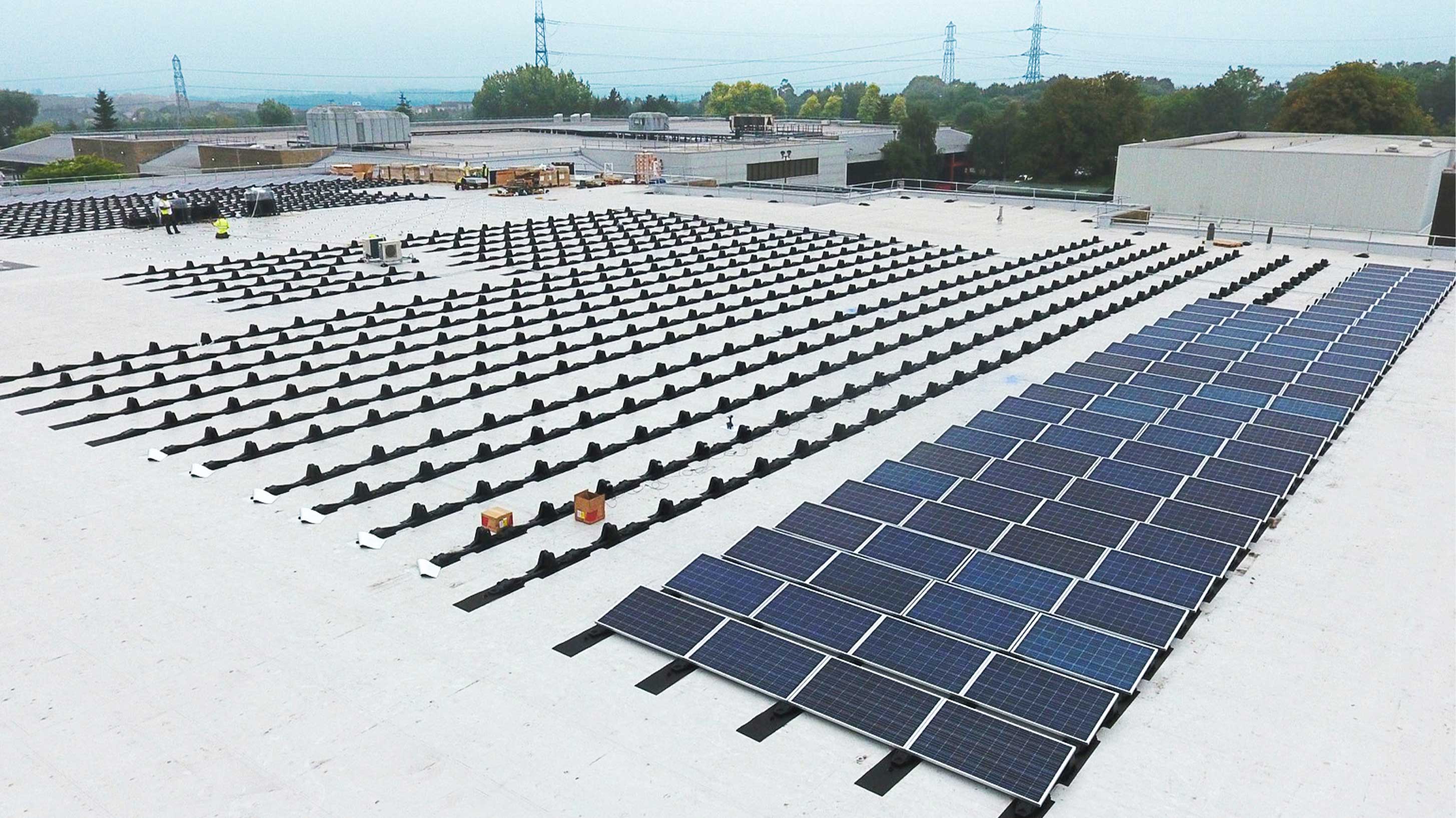 Roof of University of West England Enterprise Zone showing array of solar panels installed on Bauder Thermofol PVC waterproofing system