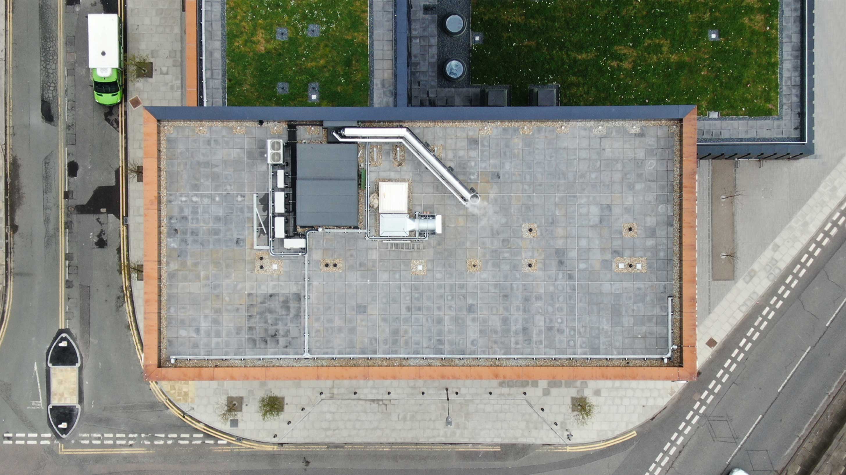 Aerial view of River Street Tower with Bauder Bakor Hot Melt structural waterproofing system with mixed landscaping