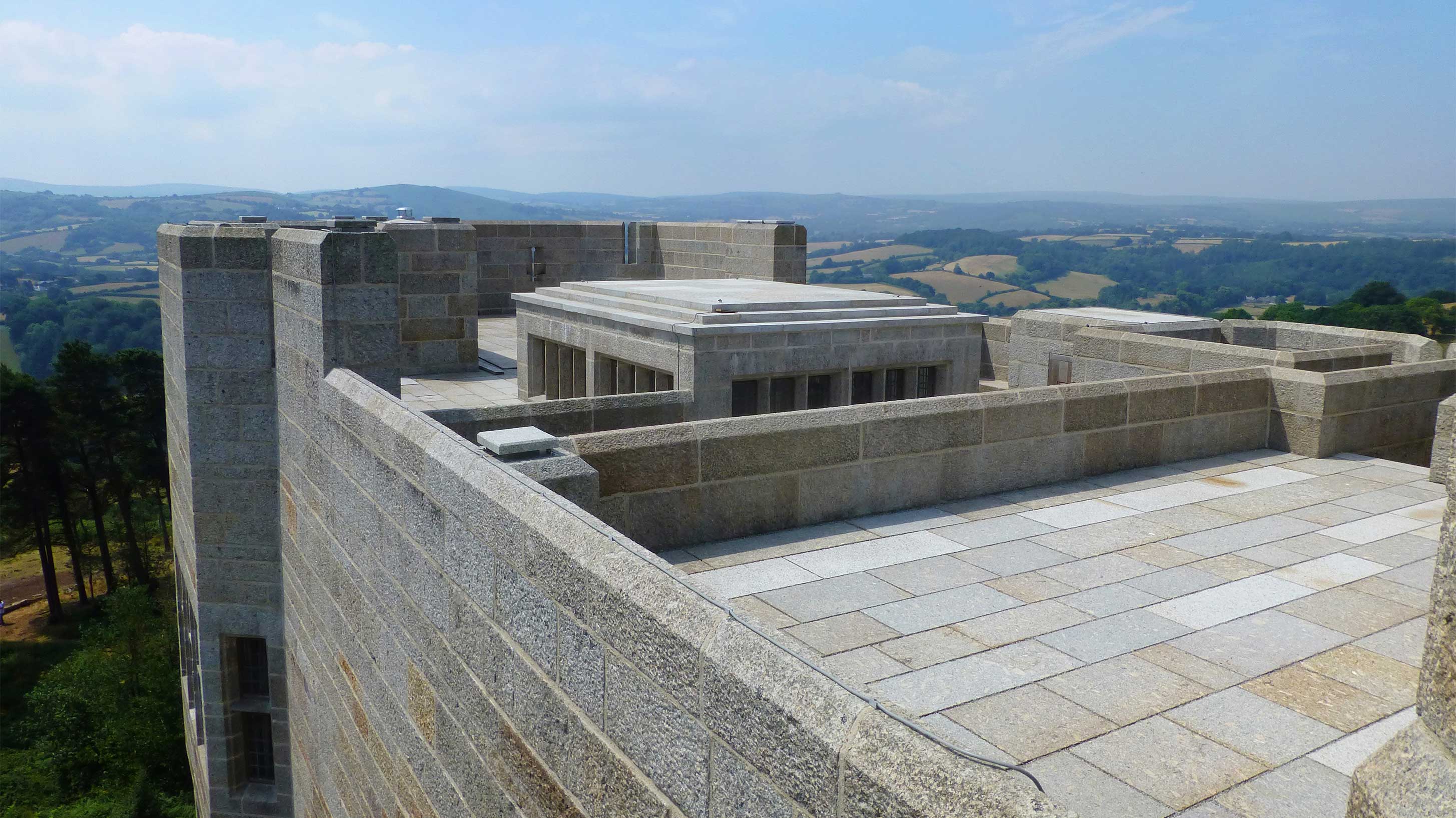 Castle Drogo roof with scenic view in background
