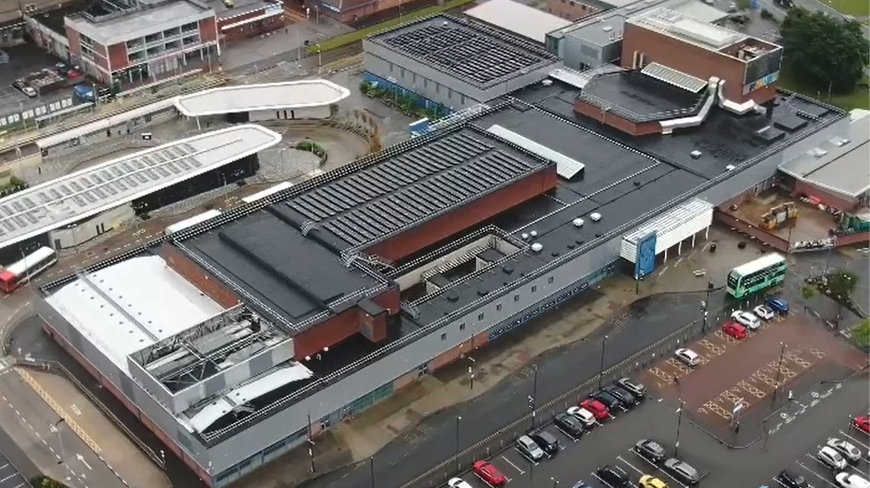 Aerial view of Wythenshawe Forum with Bauder Total Roof System installed with BauderSOLAR F