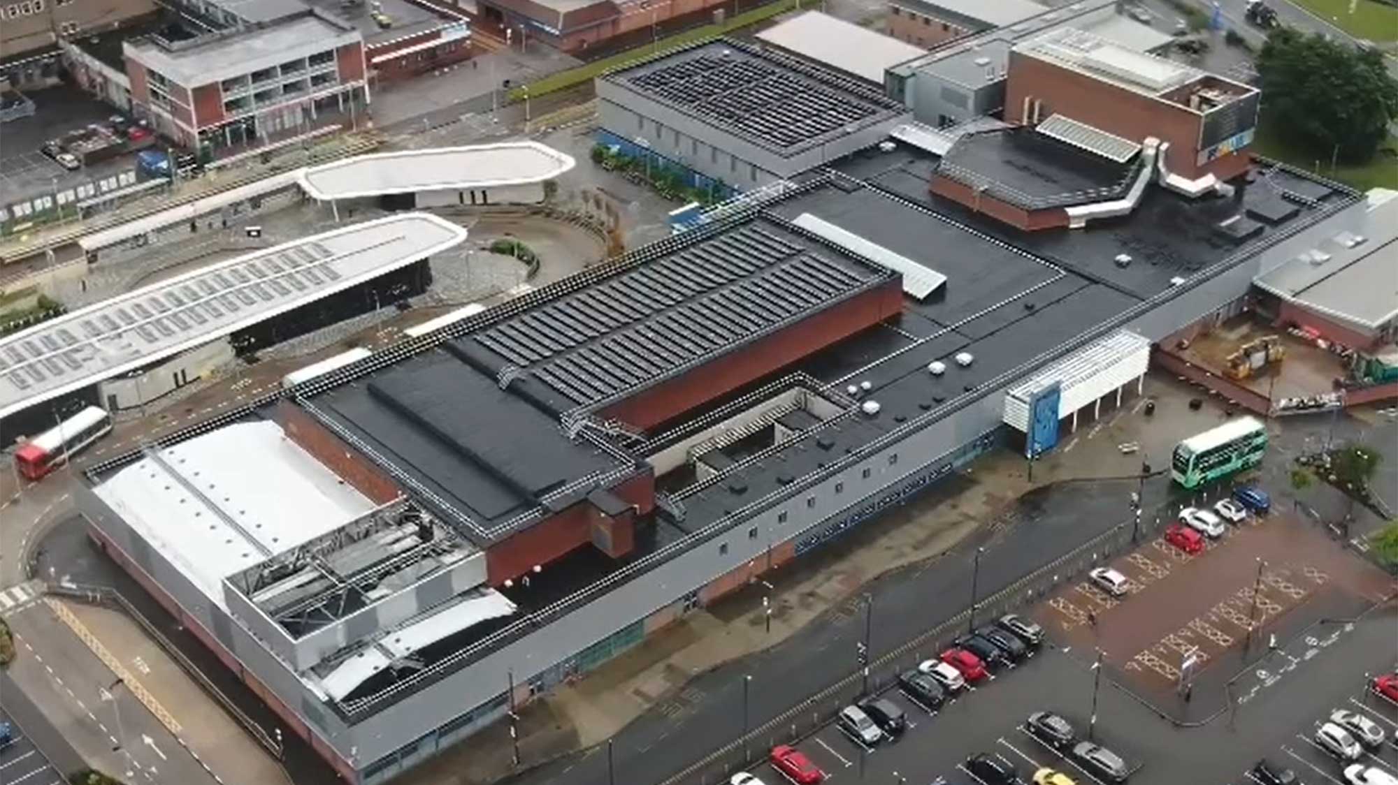 Aerial view of Wythenshawe Forum with Bauder Total Roof System installed with BauderSOLAR F