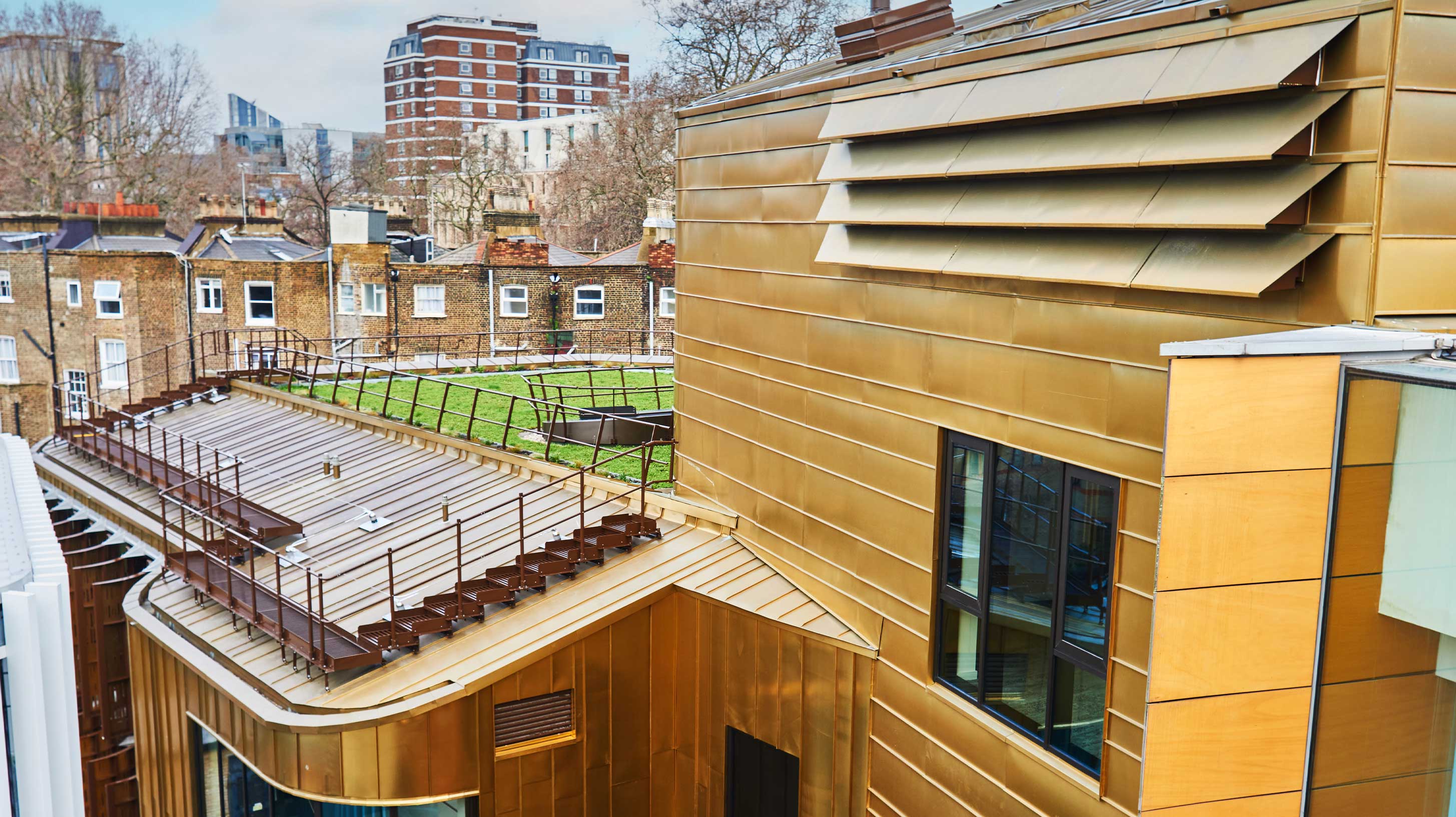 Modern architectural building with green roof to provide environmental benefits