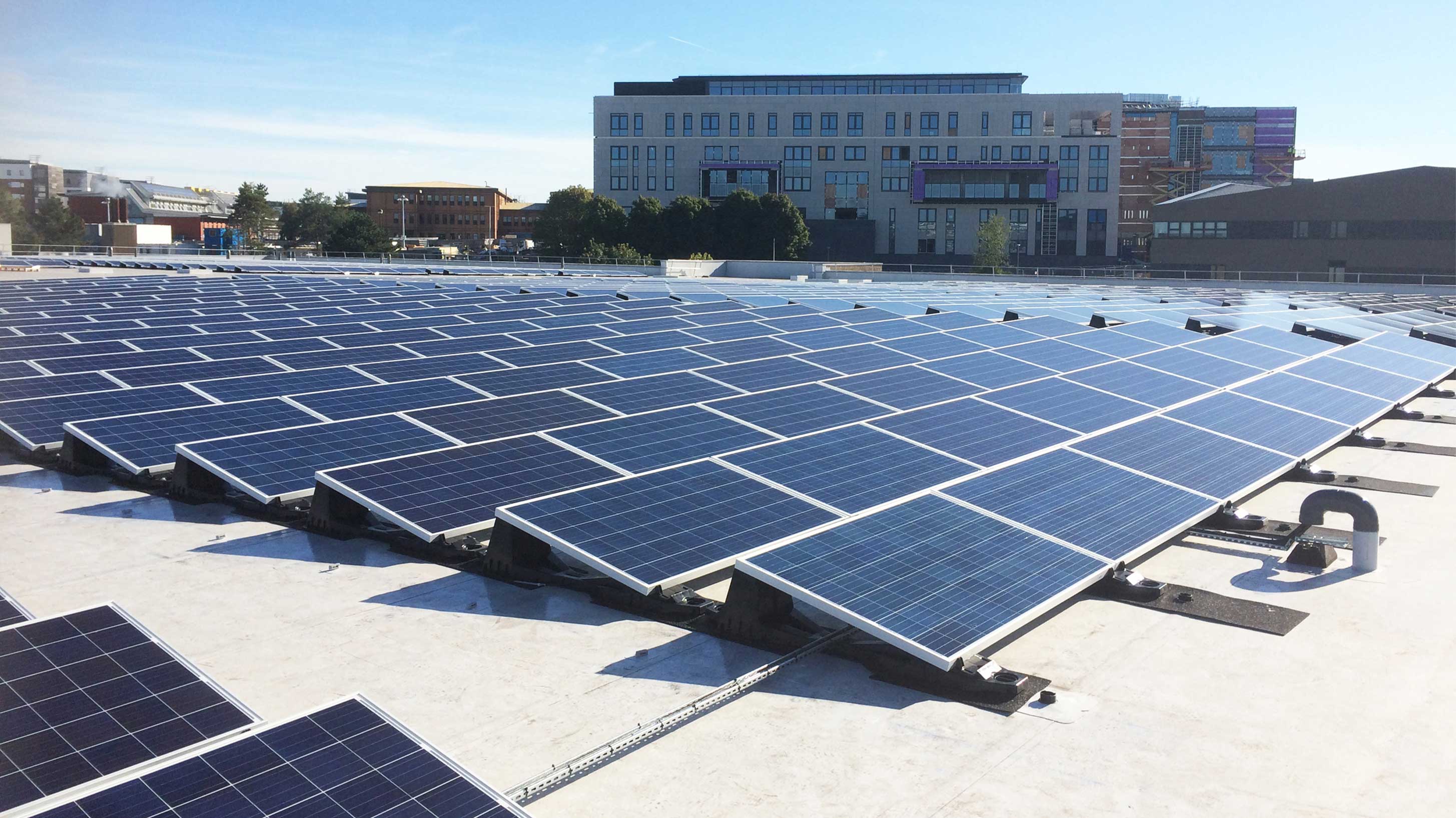 Roof of University of West England Enterprise Zone showing array of solar panels installed on Bauder Thermofol PVC waterproofing system