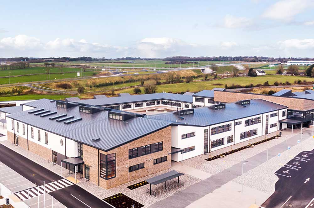 New school with a single ply PVC roof with profiled seams