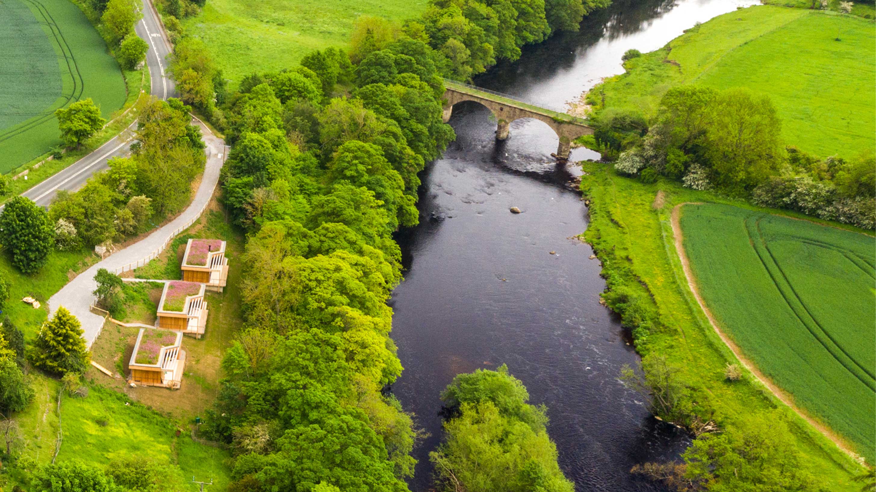 Whispering Waters. comprising of three lodges built from carbon-neutral materials, located along the banks of the River Tees in Teesdale.