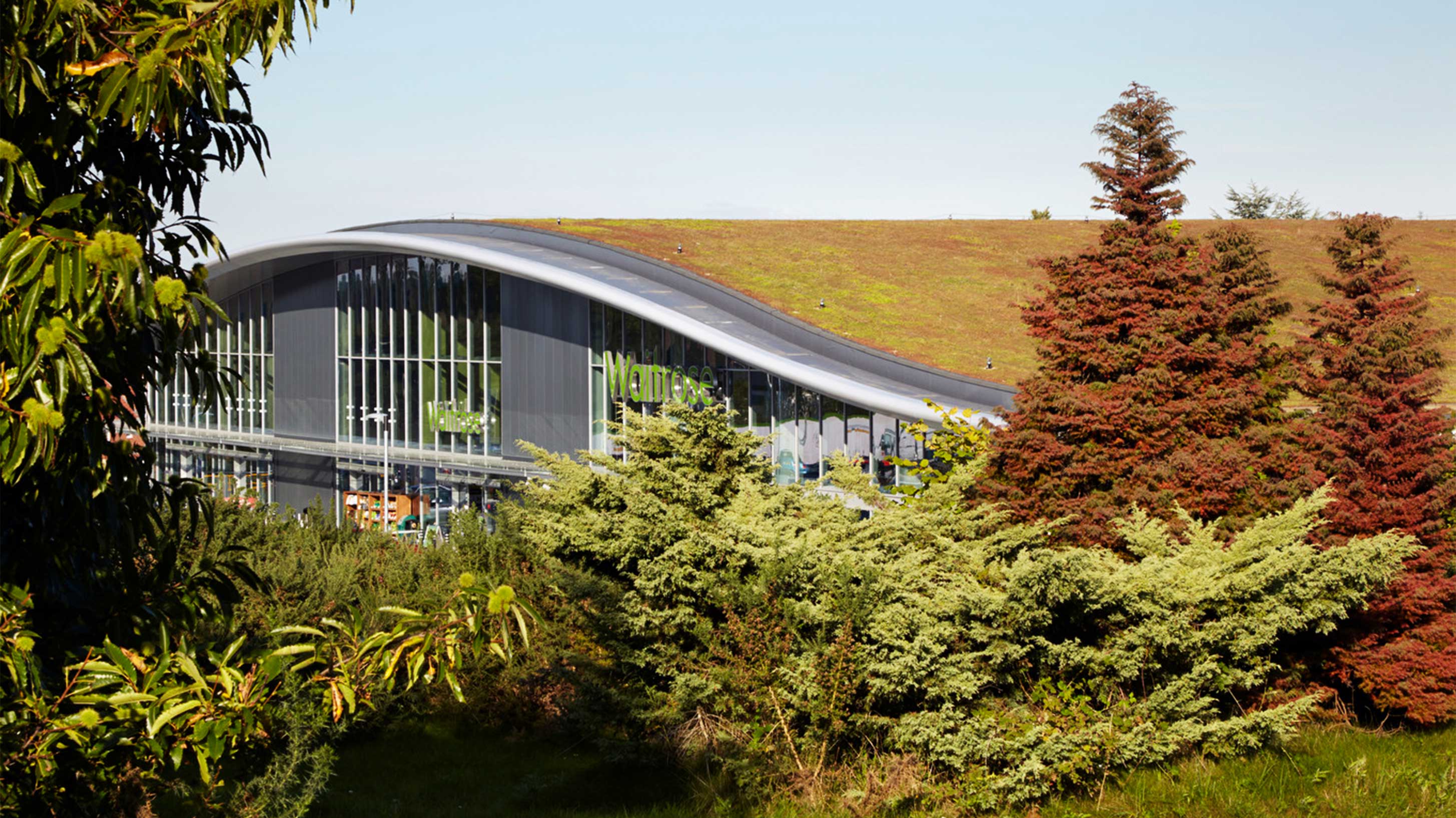 Modern building with greenery in the foreground
