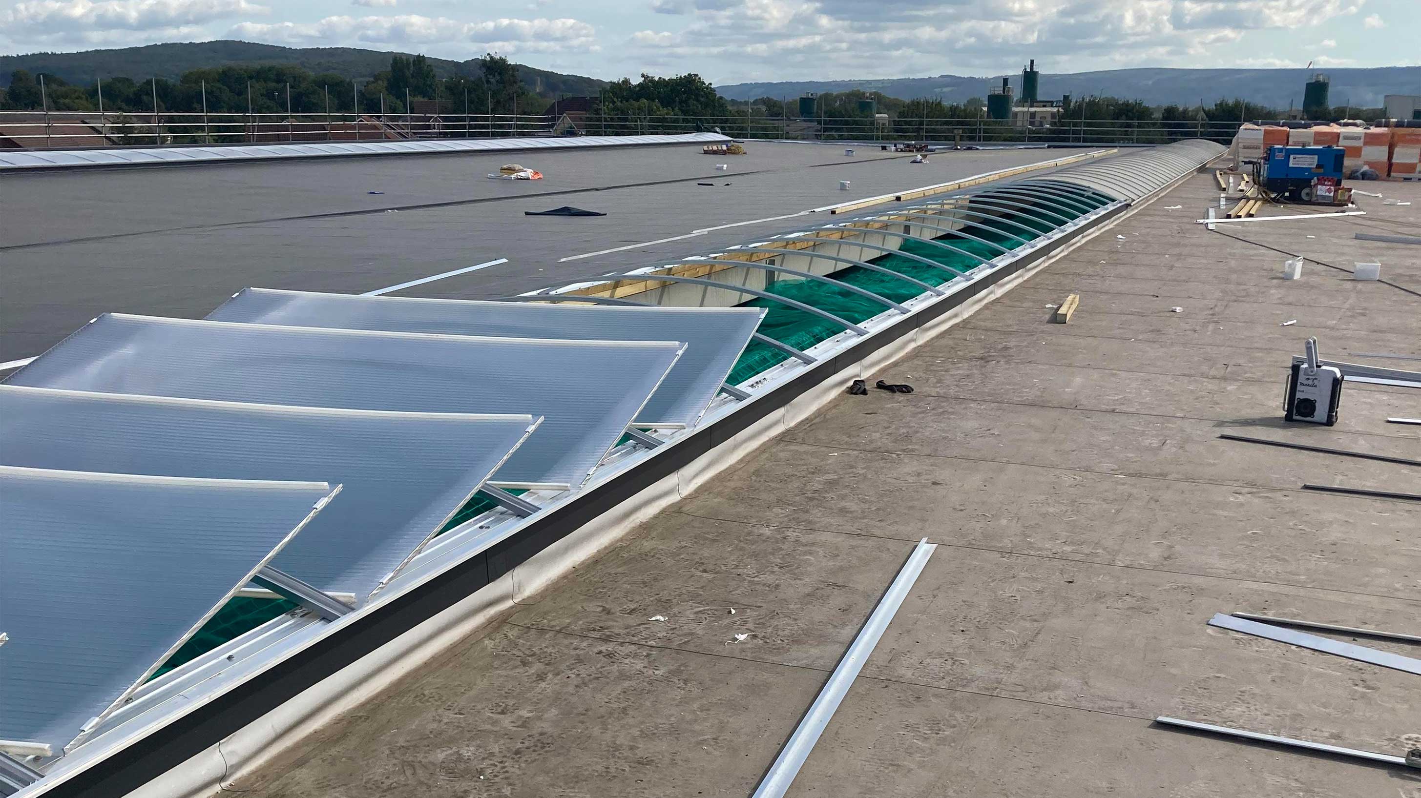 Rooflights being changed on roof of Smart Systems Ltd's manufacturing facility