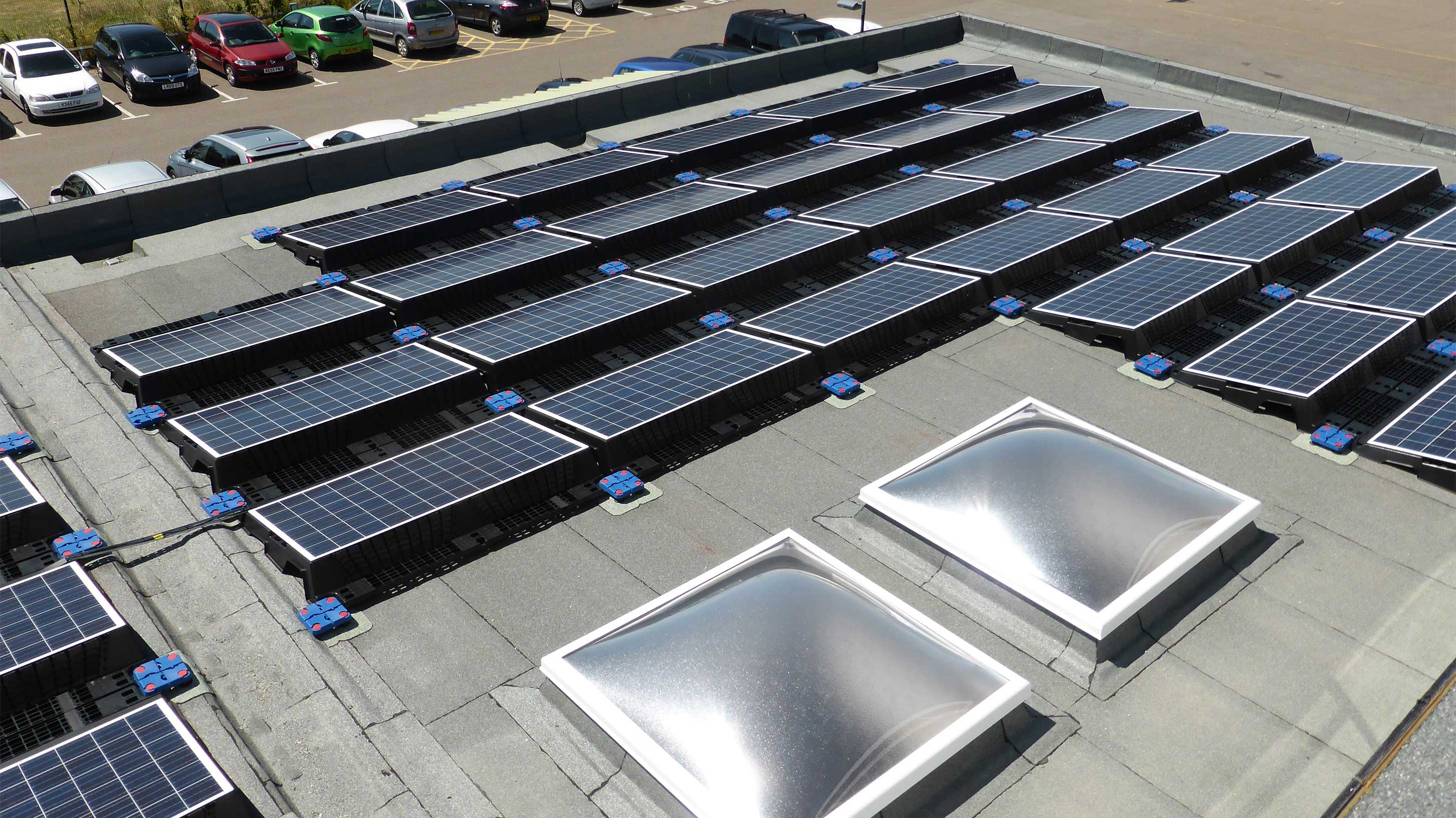 Roundwood Park School roof with Solar Panels and rooflights