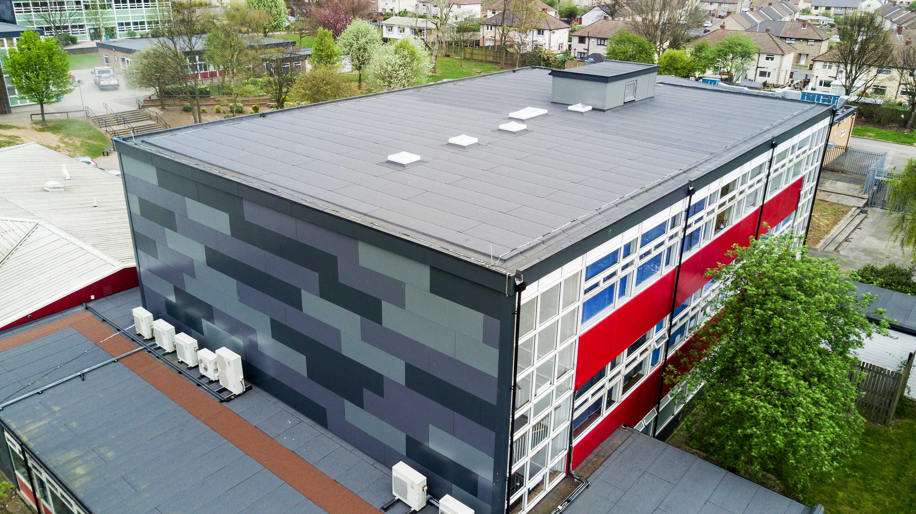Aerial view of Airedale Academy showing Bauder Total Roof System with rooflights