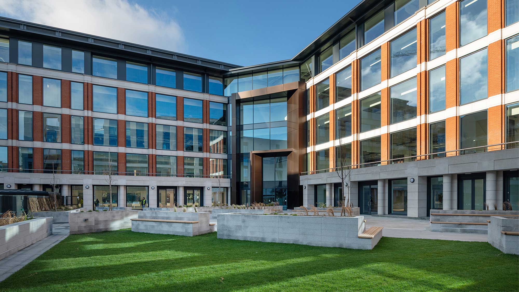 Benson House, a modern glass faced building in Leeds