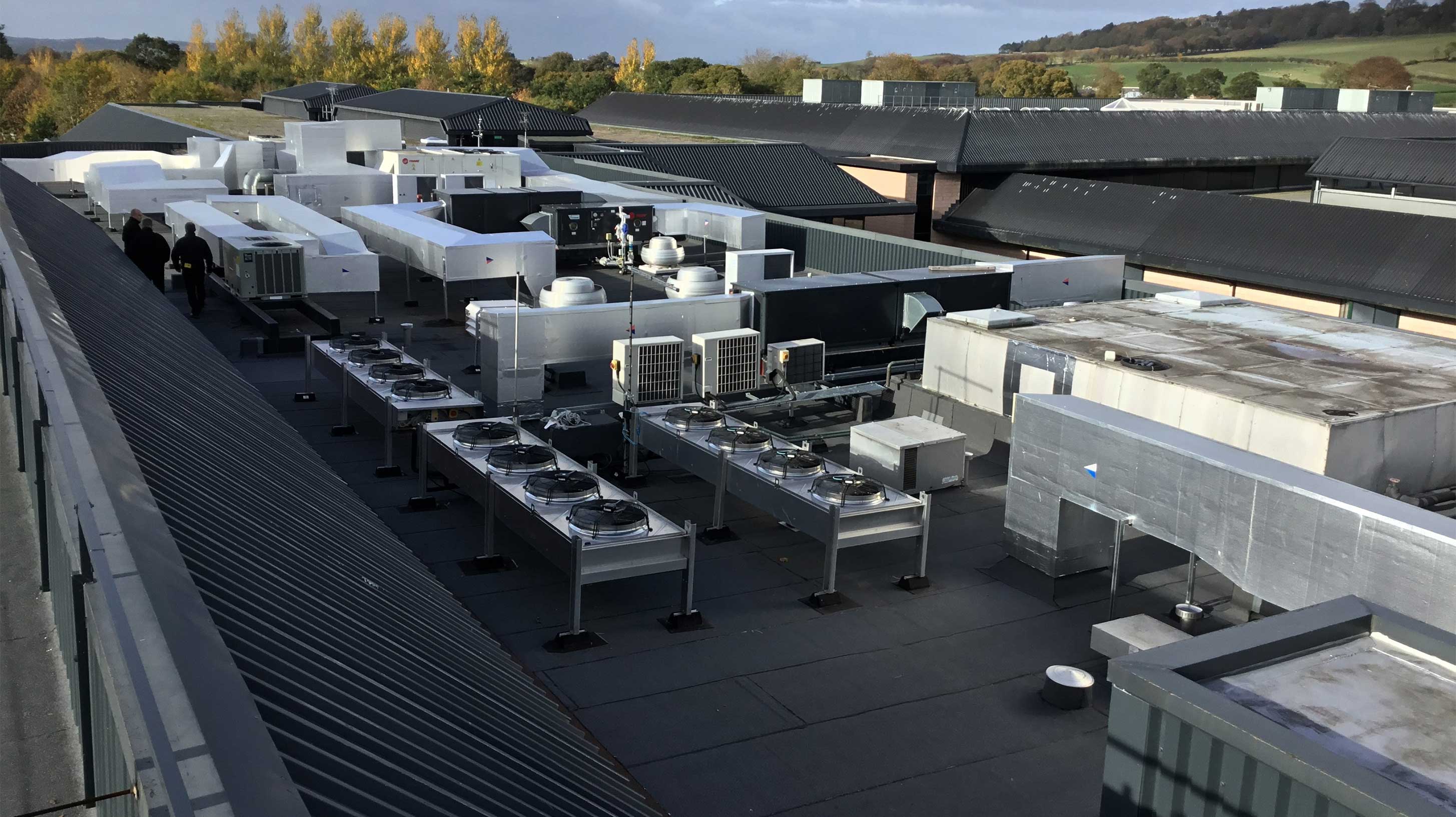 Roof of Oracle Real Estate and Facilities with Bauder Total Roof System installed carefully around units