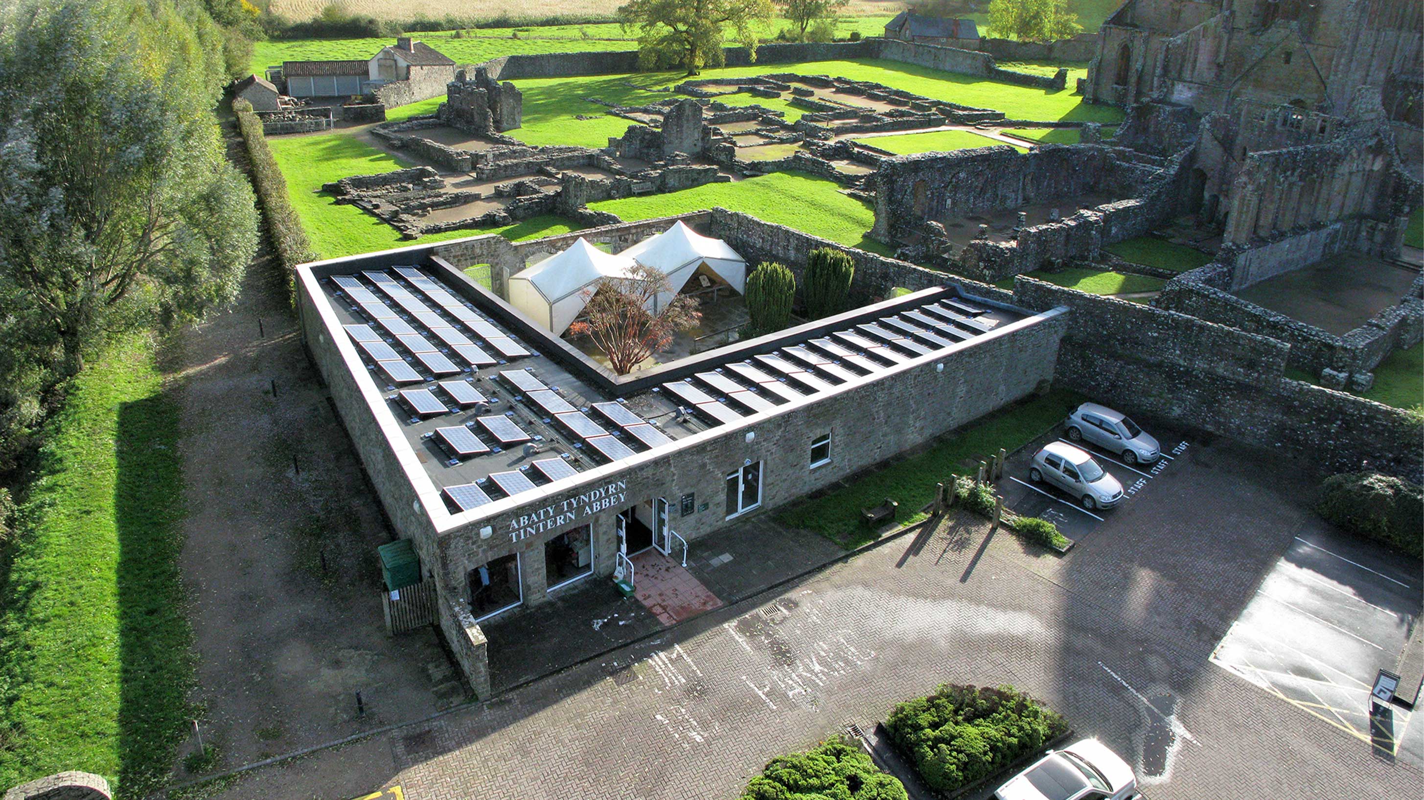 Aerial view of Tintern Abbey Gift Shop surrounded by greenery 
