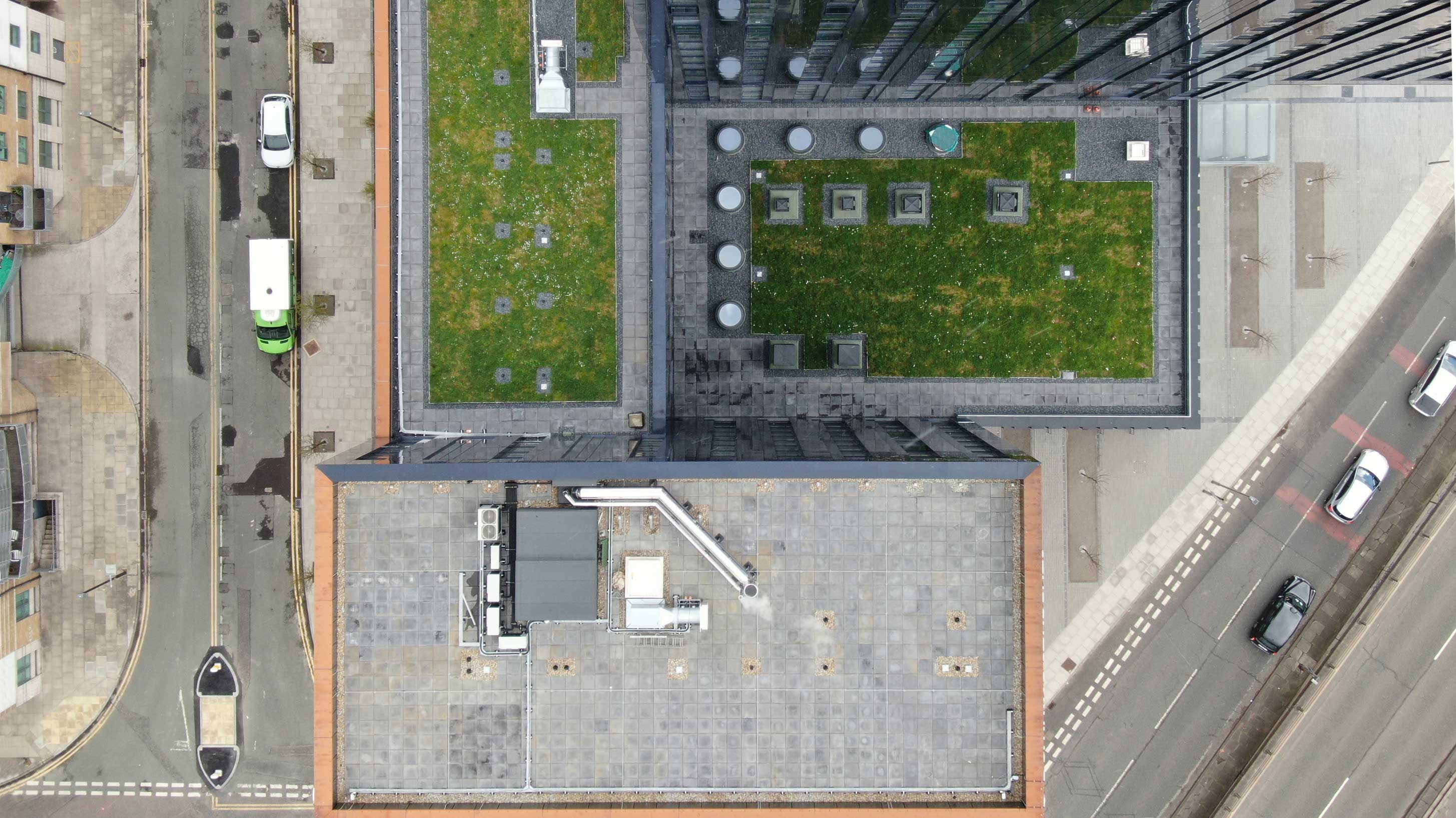 Aerial view of River Street Tower with Bauder Bakor Hot Melt structural waterproofing system with mixed landscaping
