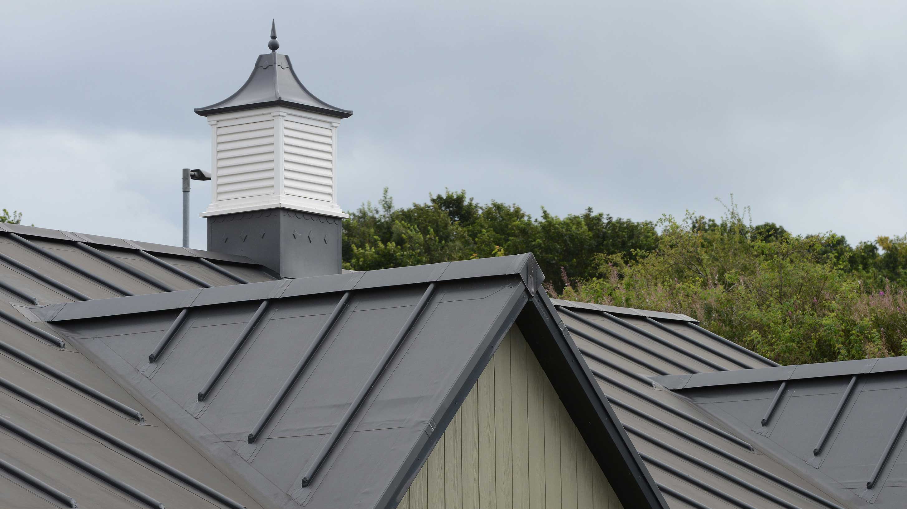 Den Court roof with Bauder Thermofol single ply waterproofing system installed