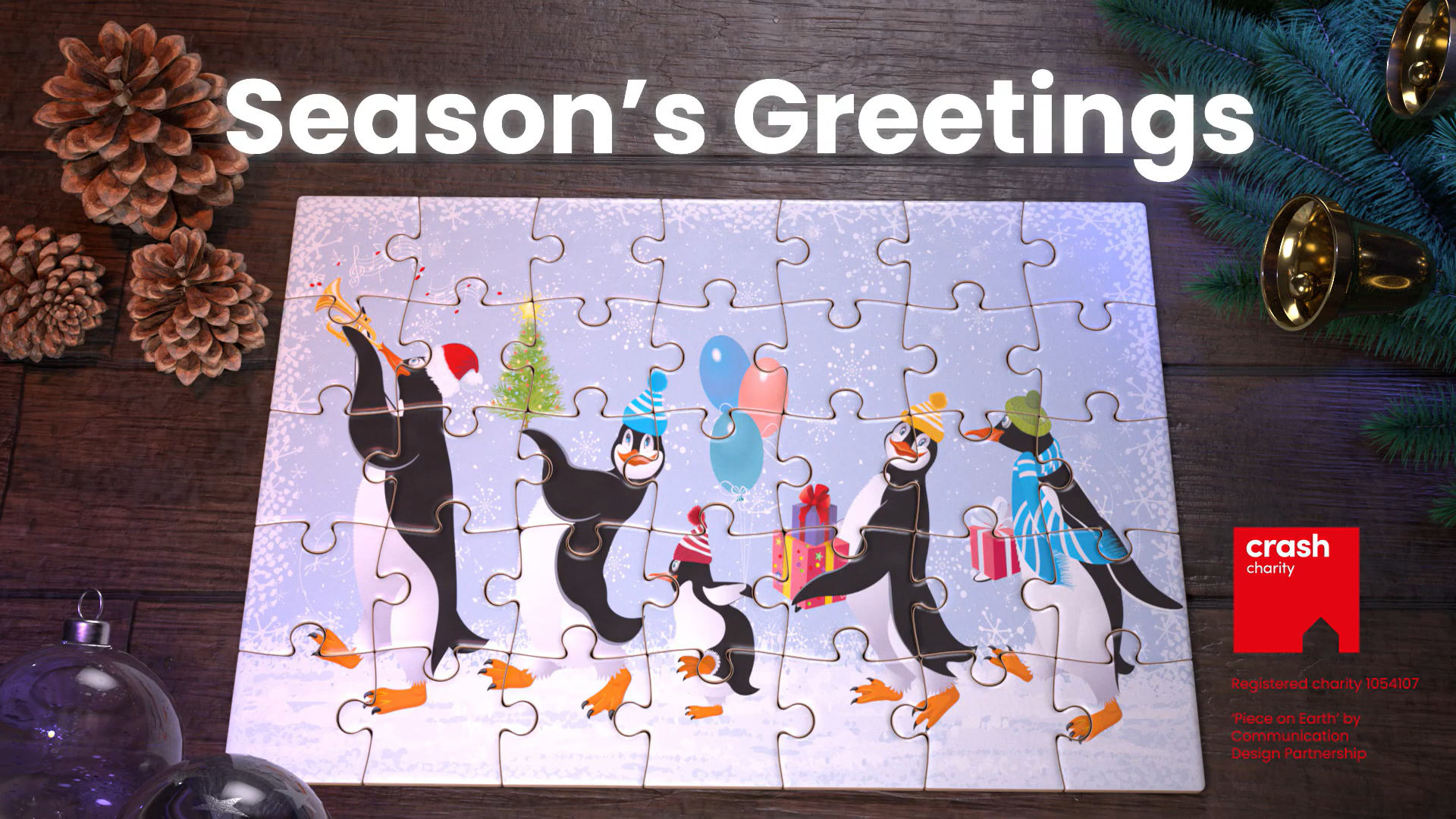 seasons greeting's thumbnail of completed Dolphin puzzle with CRASH charity logo