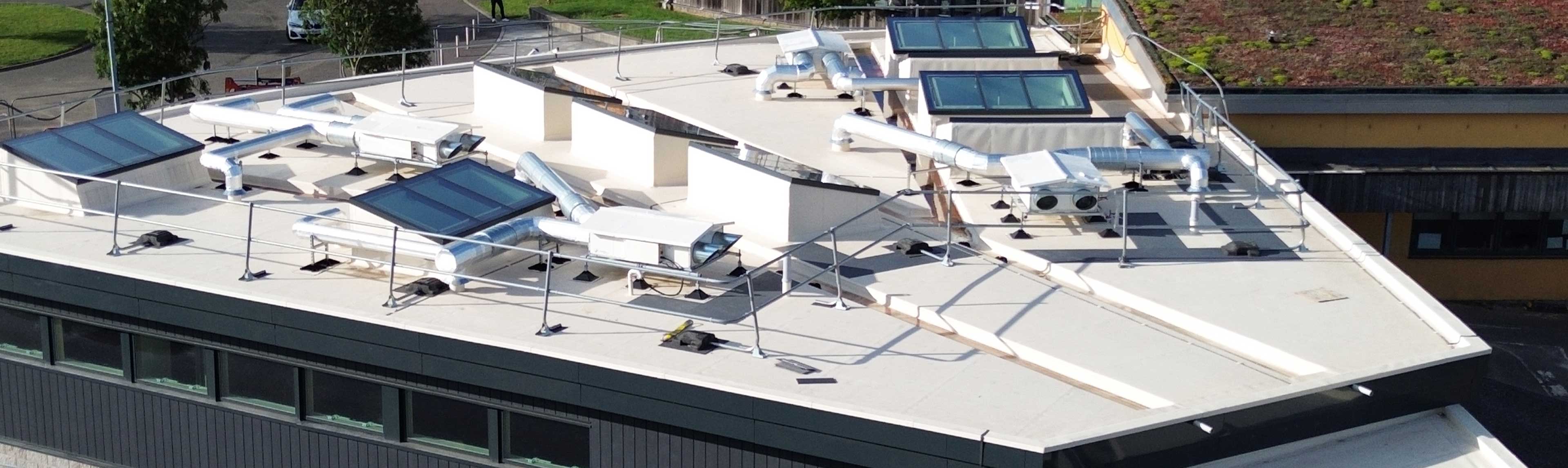 School building with a single ply FPO waterproofing system