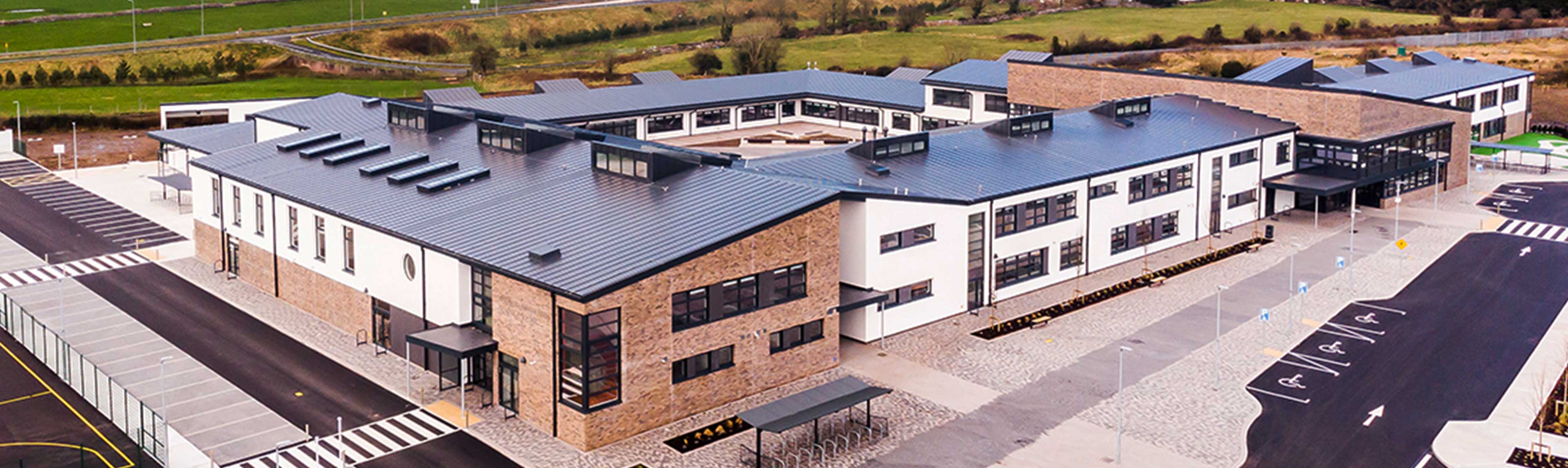 New school with a single ply PVC roof with profiled seams
