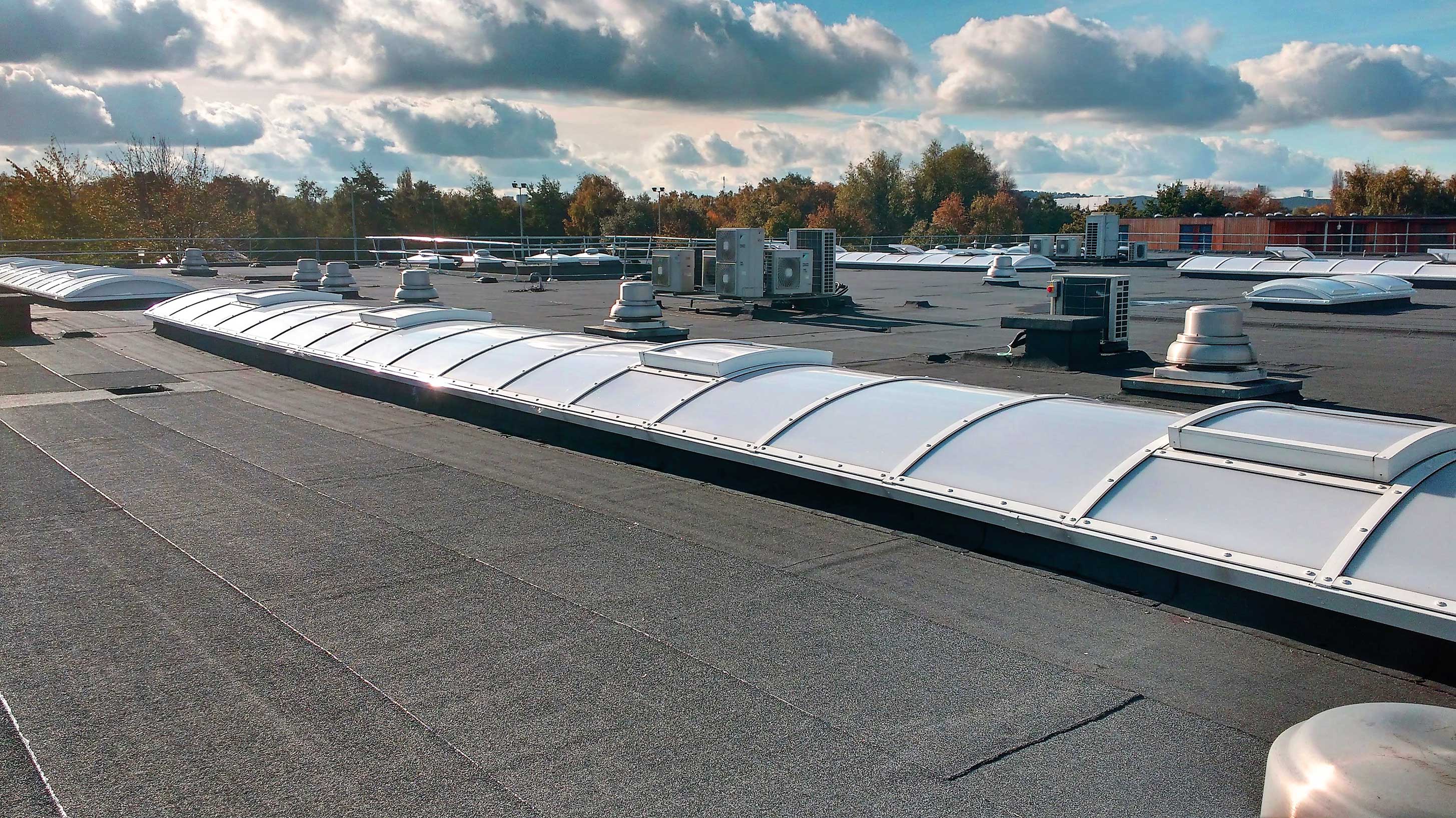 Woolwich Polytechnic School with Bauder Total Roof System (BTRS) installed with Euroglaze rooflights