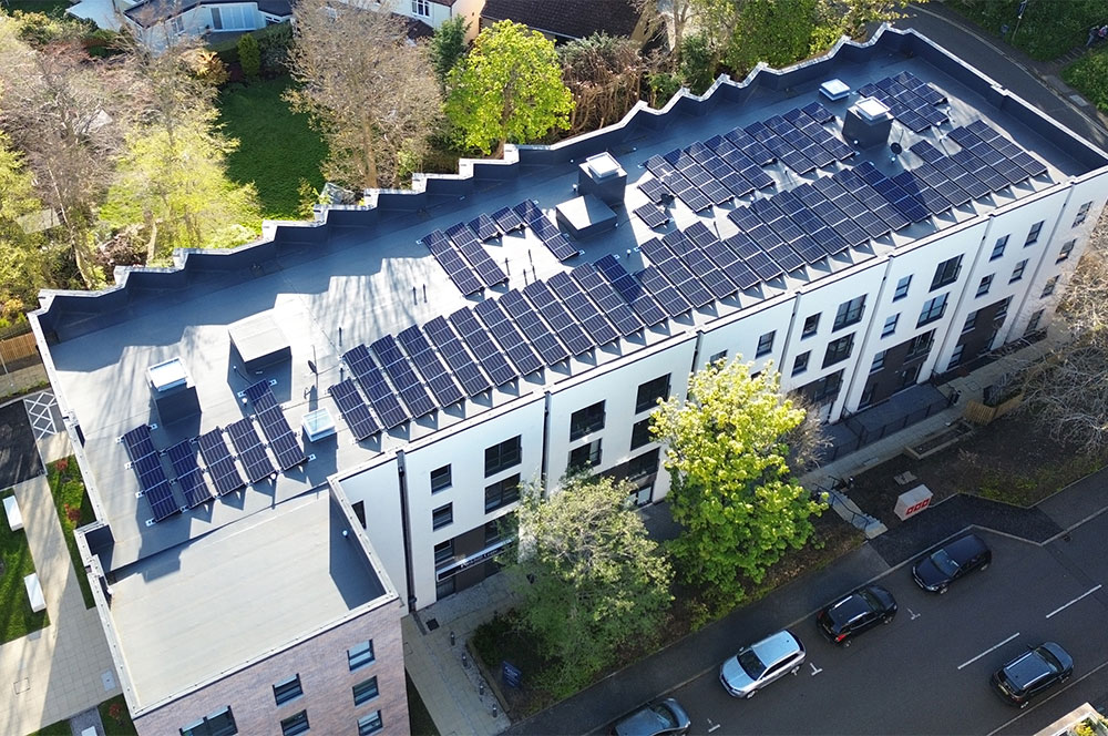 Aerial view of Pinkhill Gate roof with BauderThermofol PVC single ply waterproofing system and Solar PVs