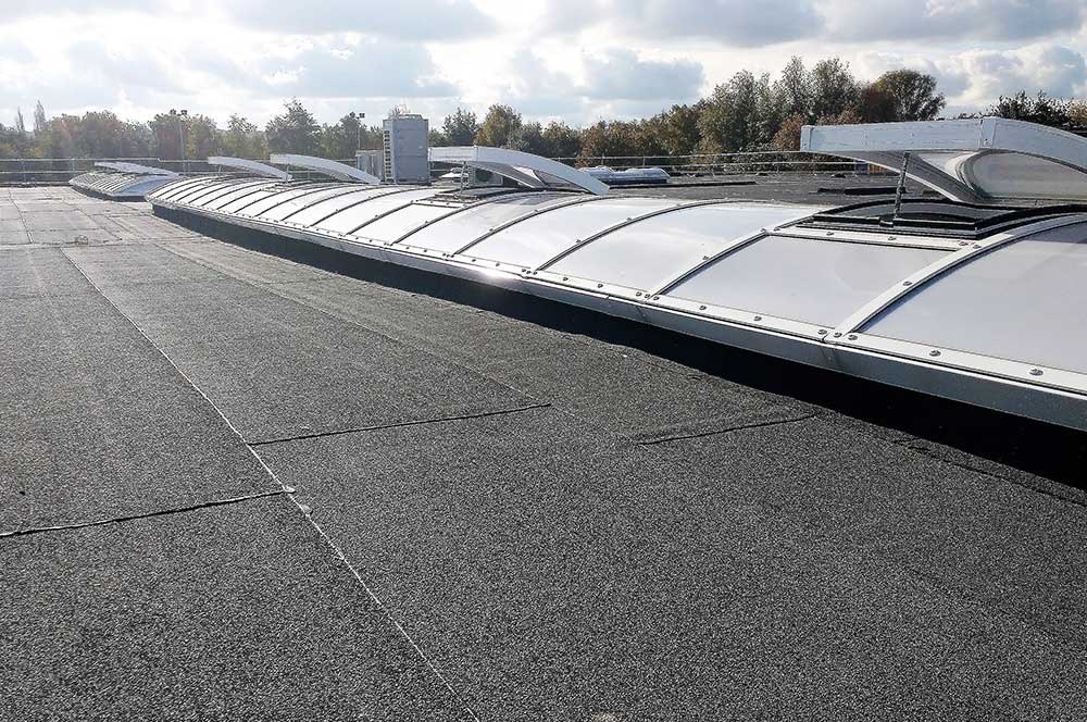 Woolwich Polytechnic School with Bauder Total Roof System (BTRS) installed with Euroglaze rooflights