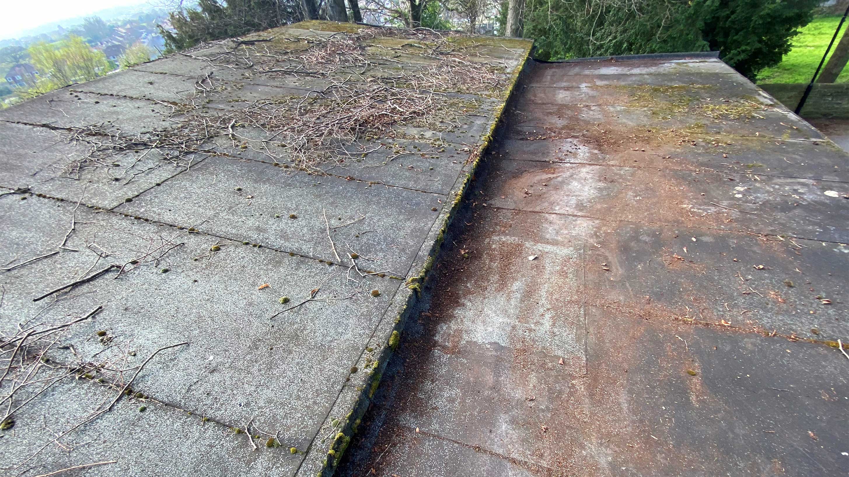 Vandalised and damaged roof with rafter needing attention