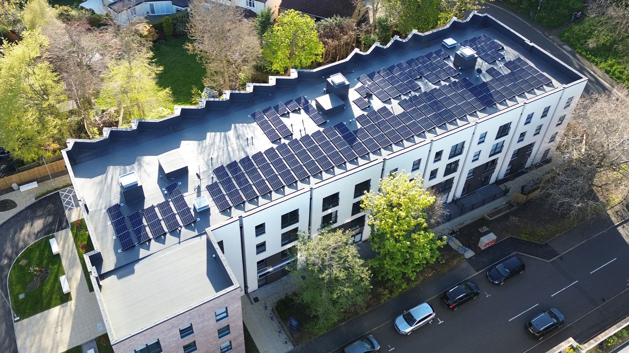 Aerial view of Pinkhill Gate roof with BauderThermofol PVC single ply waterproofing system and Solar PVs