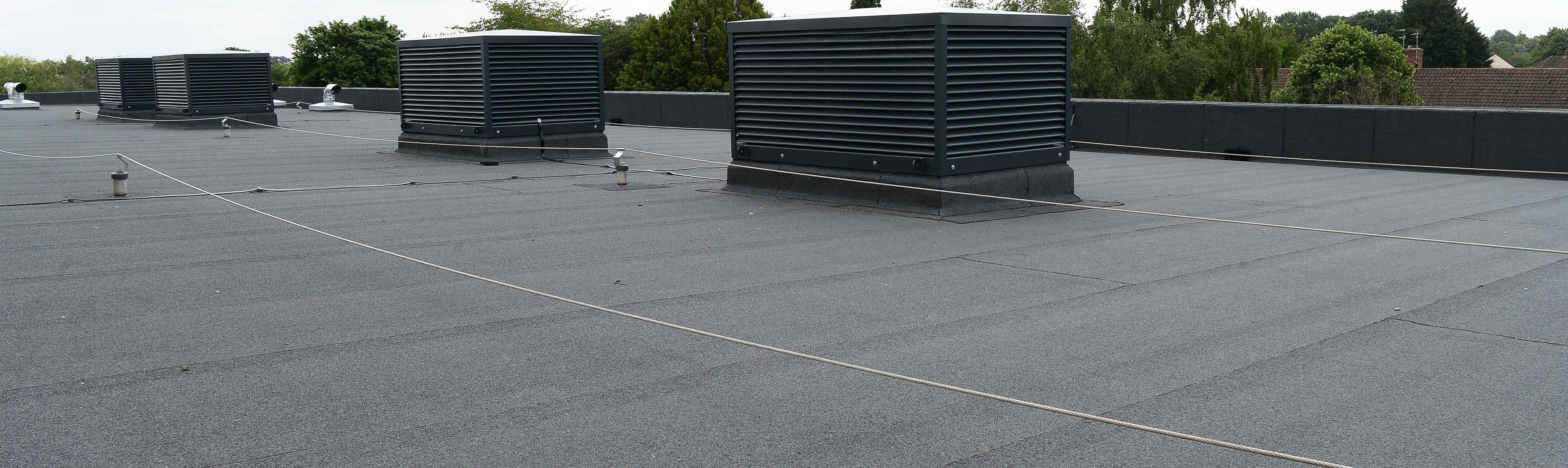 Paxman academy with bauder flat roof waterproofing solution