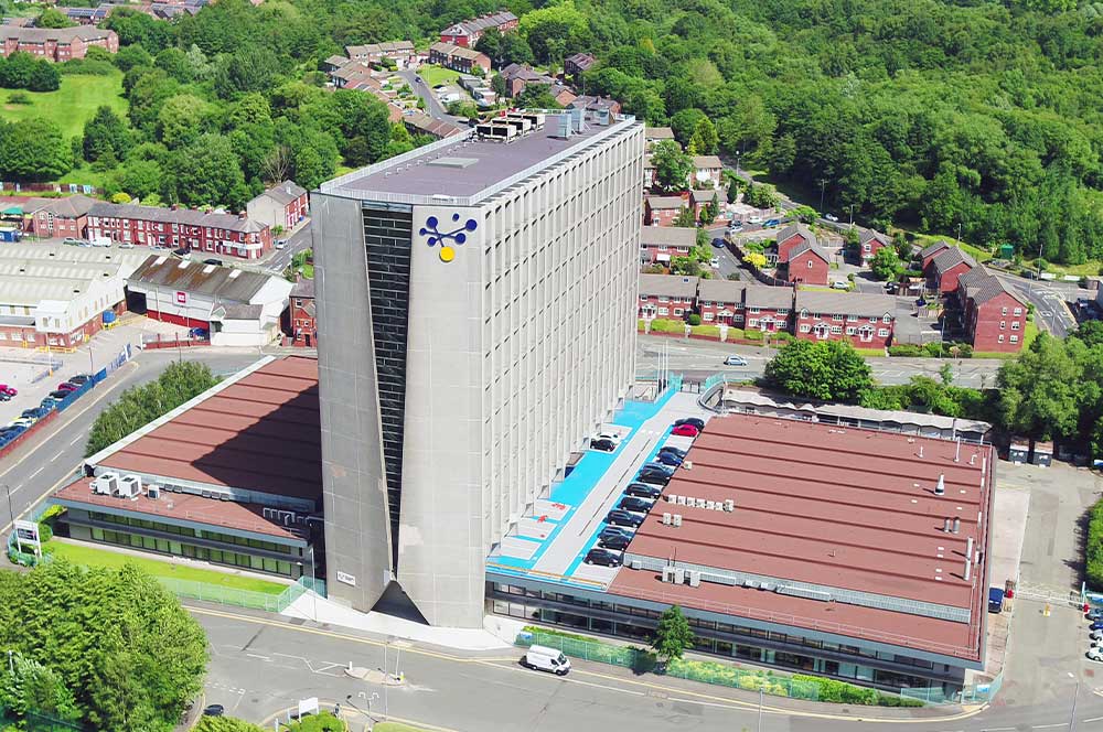 Aerial view of Hexagon Tower, Manchester, with Bauderflex bituminous waterproofing system installed on roof